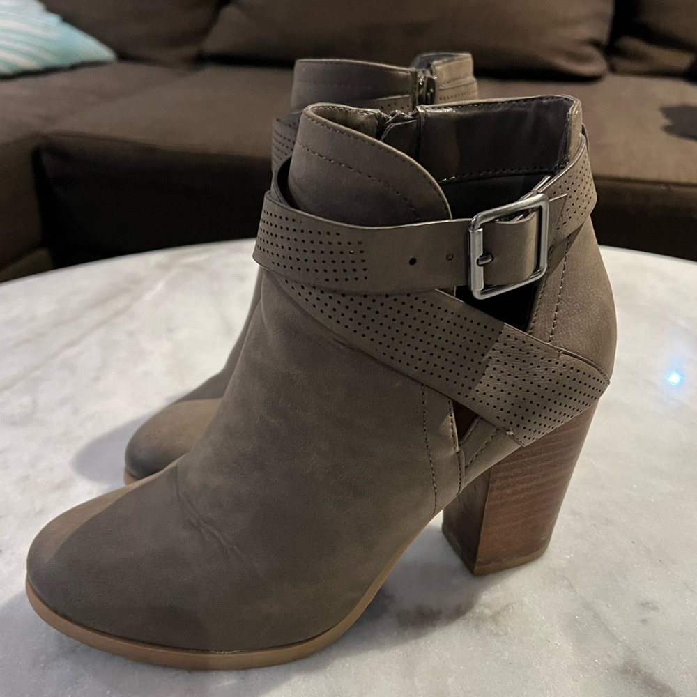 Spring heeled ankle boots